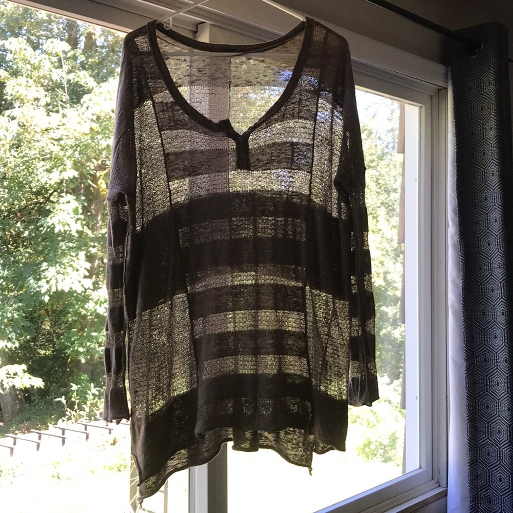 Free people light Brown shirt.  Size extra small.